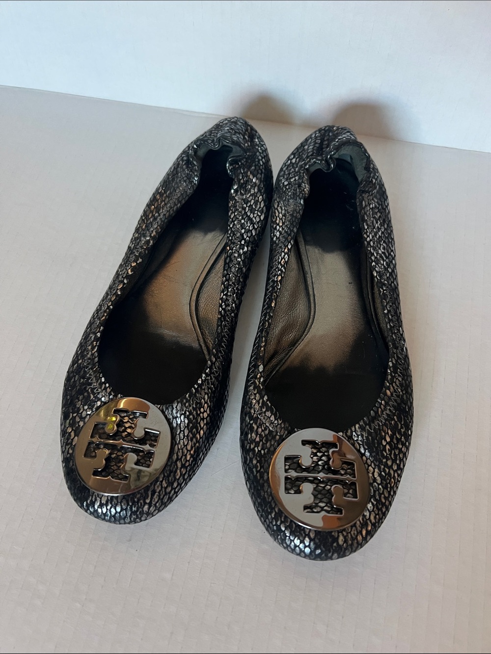 Tory Burch Black Snake-Print Embossed Reva Flats with Gold Logo